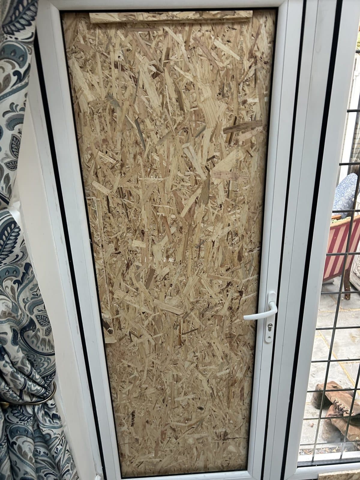Boarded door made good — before, Surrey