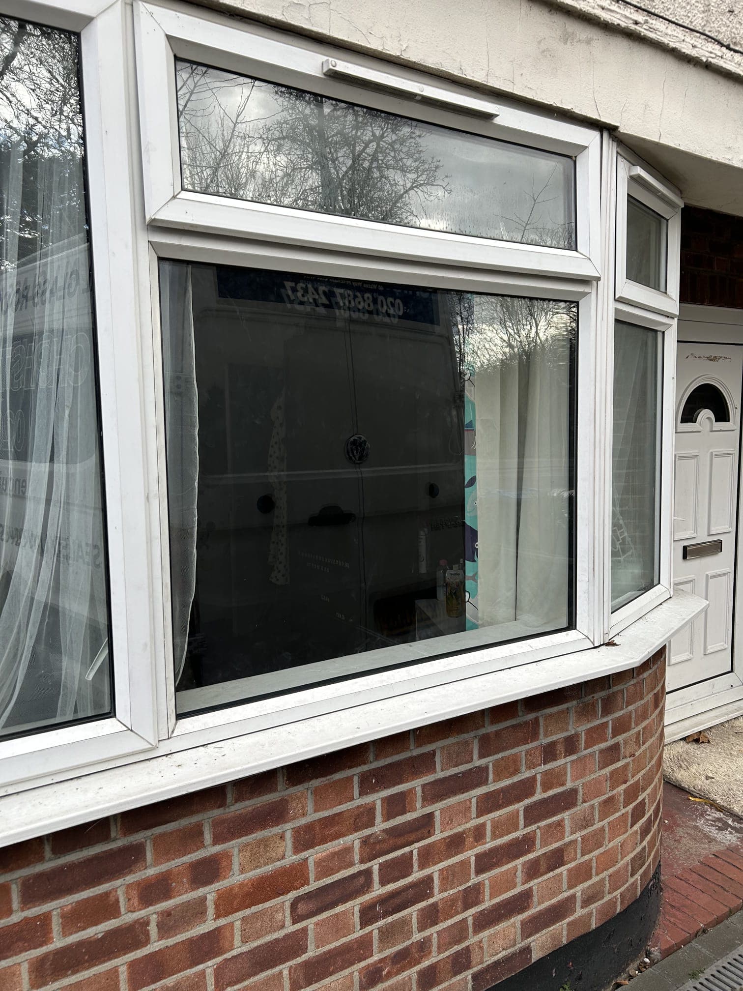 Leaded bay window — Carshalton